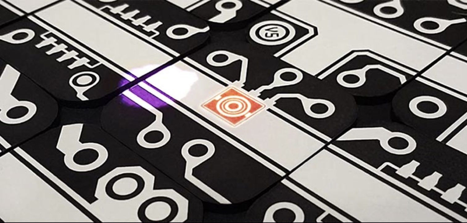 Lab² – A collaborative cross-reality game for virtual team building